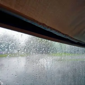under a RV Slide Out Awning in the rain